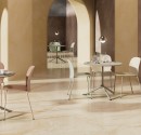 Café tables with Café chairs in sand, mint and rosa colors. 