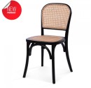 Café chair with black wooden frame and a rattan seat and back.