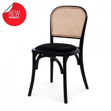 Stackable wooden café chair, with a black velvet seat and rattan back. 