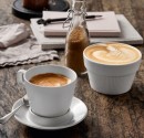 White porcelain cups for espresso and cappuccino.