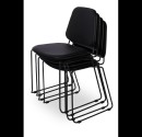 Four seminar chairs stacked. Black artificial leather on seat and back and black steel frame. 