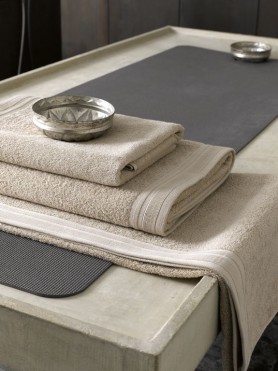 Towels for wellness, spa and beaty salons in Beige color. 